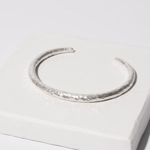 Thin adjustable cuff bracelet in handmade in sterling silver.