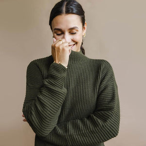 Cozy handcrafted sweater in the softest merino wool. Ethically crafted in Nepal.
