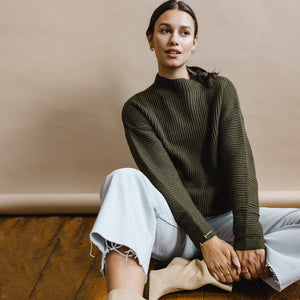 Cozy olive green turtleneck sweater by Dinadi for Mulxiply.