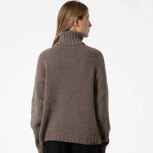 Timeless, handknit sweater in natural oat brown.