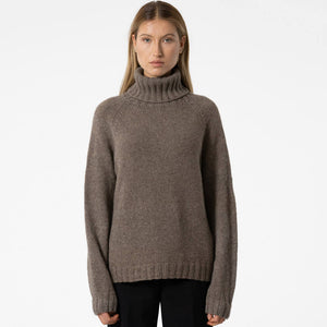 Chunky natural turtleneck sweater in organic yak cashmere. Ethically crafted sweater by Dinadi for Mulxiply.