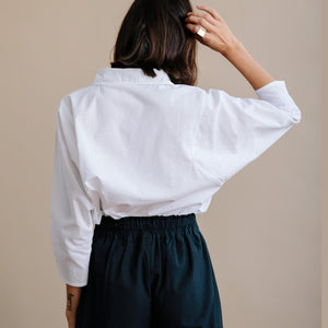 Tucked in our worn out, this white button down is a sure staple in your capsule wardrobe. 