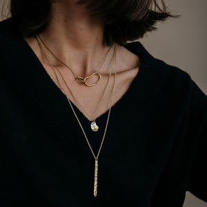Necklaces made for layering. Designed in Maine, artisnan-made in Nepal.
