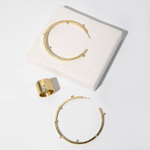 Modern, brass jewelry made for collecting.