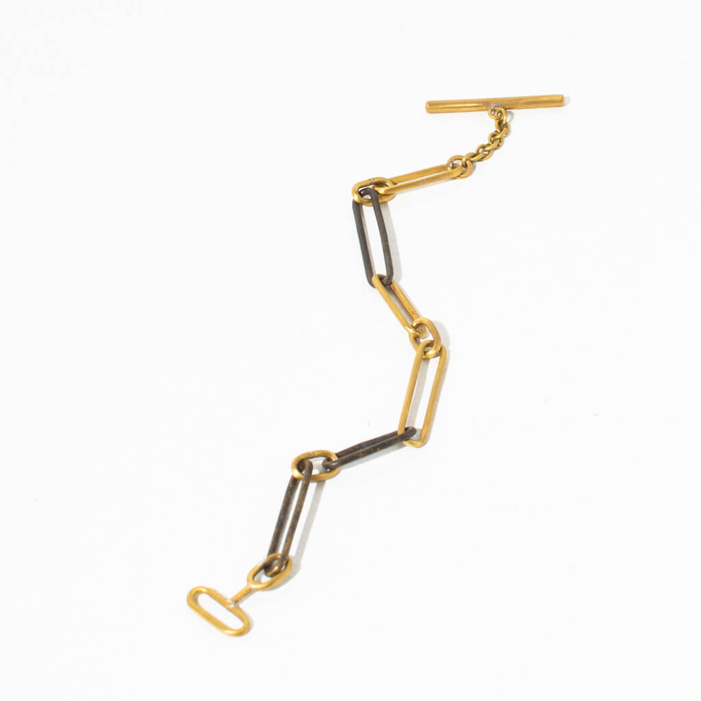 A modern twist on the chain bracelet. Ethically made by artisans in Nepal.