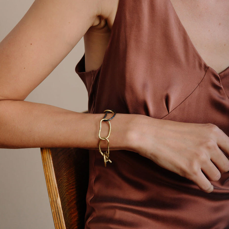 Chunky, chain link bracelet in mixed metals. Designed by Tanja Cesh in Portland, Maine.