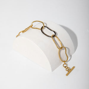 Chunky, chain link bracelet in mixed metals. Designed by Tanja Cesh in Portland, Maine.
