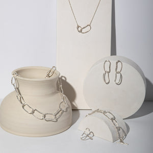 Contemporary, handmade sterling silver chain link jewelry.
