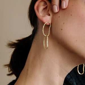 These earrings make any occasion festive. Hammered in brass.