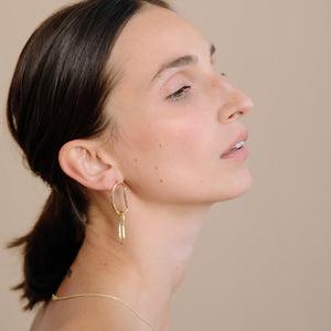 Lightweight and effortlessly modern, these earrings are stunning in brass or sterling silver.