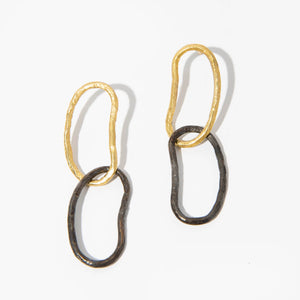 Capture the light in these organic pool-shaped earrings. Handmade by fair wage artists in Nepal.