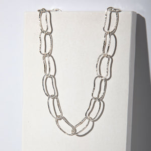 Dramatic sterling silver statement necklace. Designed by Tanja Cesh in Portland, Maine.