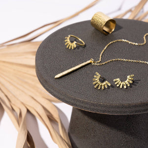 The Hammered Ray Collection of handmade brass jewelry by Mulxiply.