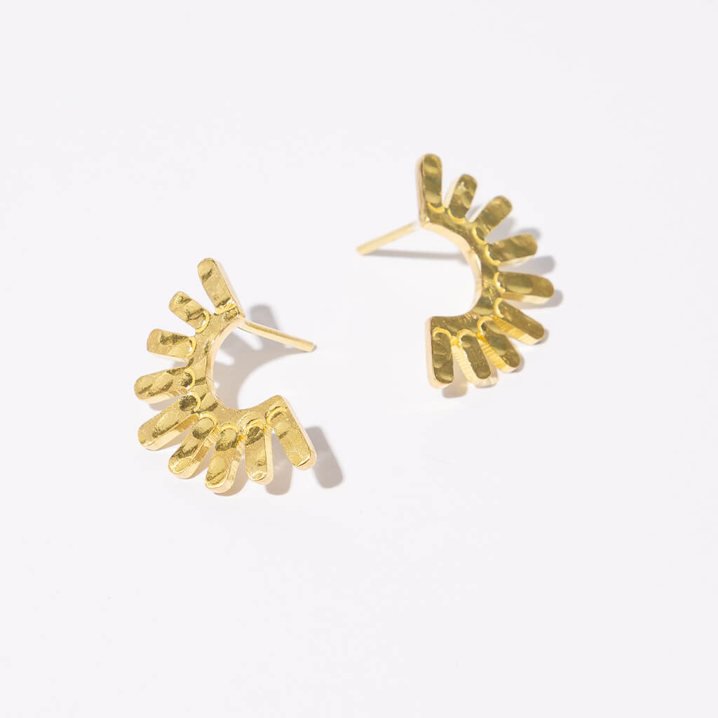 Ray Earrings in brass by Mulxiply.