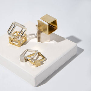 Modern square stacking rings in brass and sterling