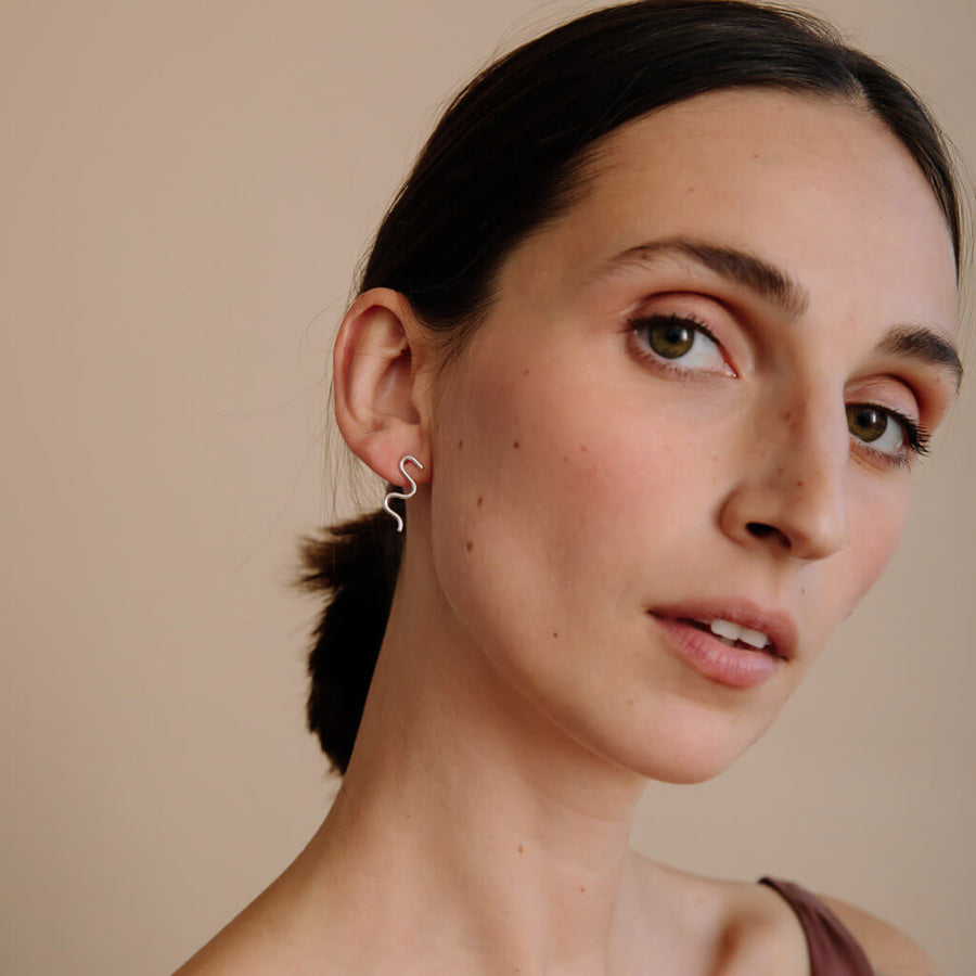 Sterling Silver squiggle earrings make for a must-have gift.