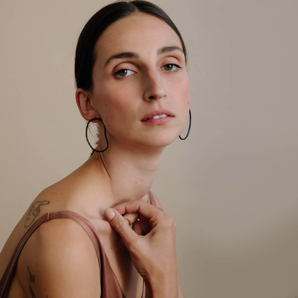 Elegant and slightly edgy, these organic pool shape earrings are a dramatic statement piece.