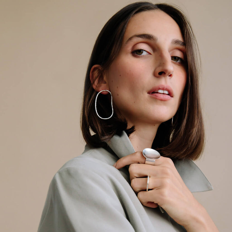 Hammered by hand, these organic shaped earrings look good on anyone.