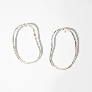 Hammered by hand, these organic shaped earrings look good on anyone.