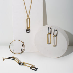 Designed in Portland, Maine and made by fair trade artisans in Nepal. Contemporary jewelry by MULXIPLY.