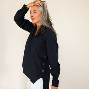 Sustainable fashion black tunic top with longer back.