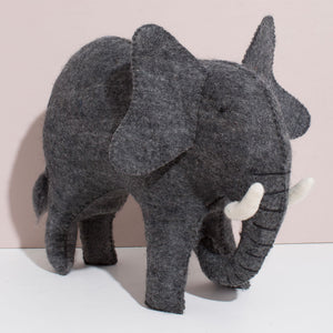 Large stuffed elephant can be used as home decor or a pillow.