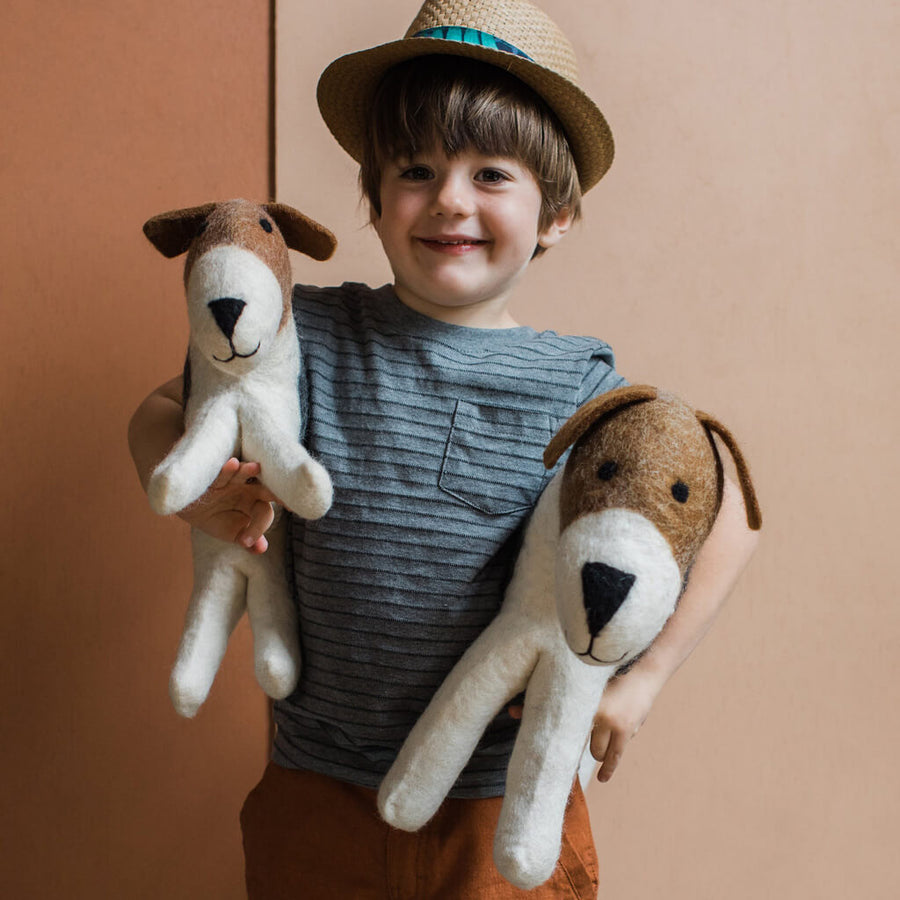 Life-sized stuffed terrier. Handmade felted dog. Terrier made by fairtrade artisans.