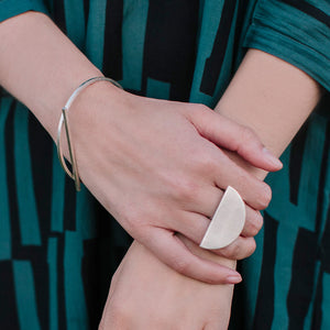Our bold minimalist statement jewelry is ethically made by master artisans in Nepal