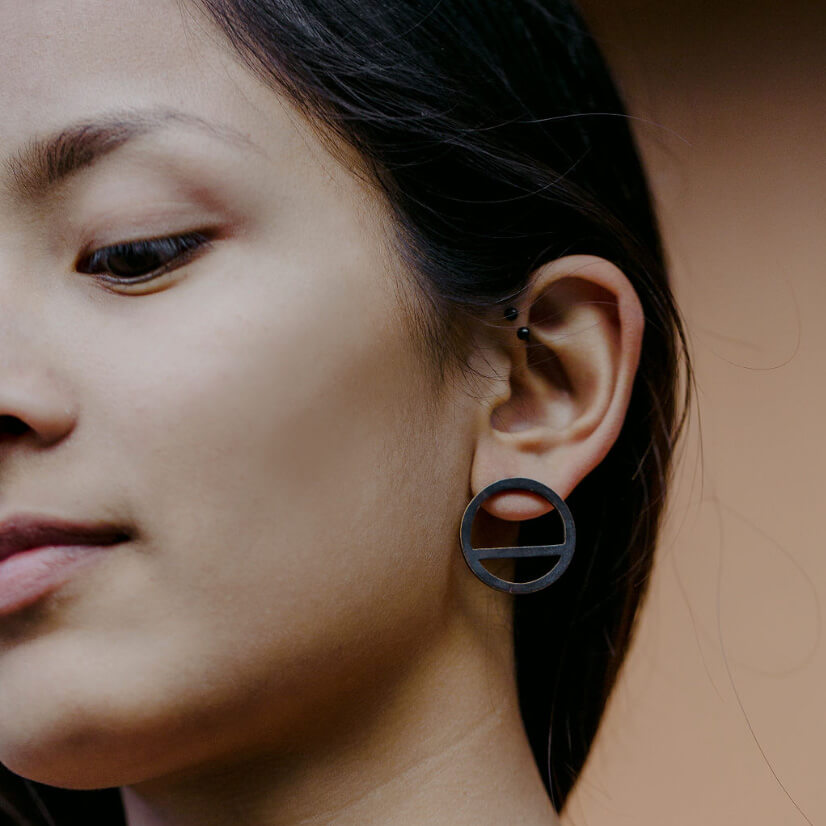 MULXIPLY Wink Circle Earrings - Oxidized Brass